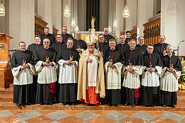 Kardinal Marx und die 18 neuen Dekane